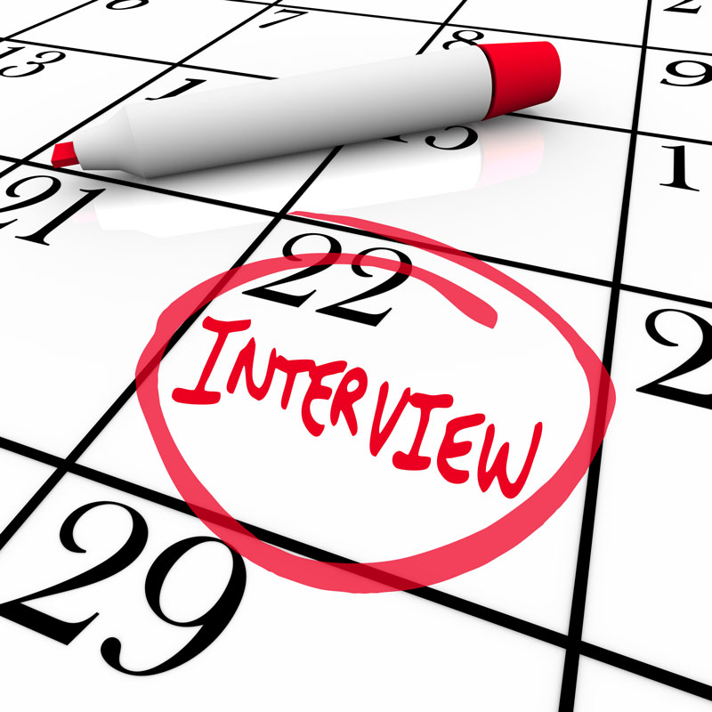 A calendar with an interview appointment circled in red